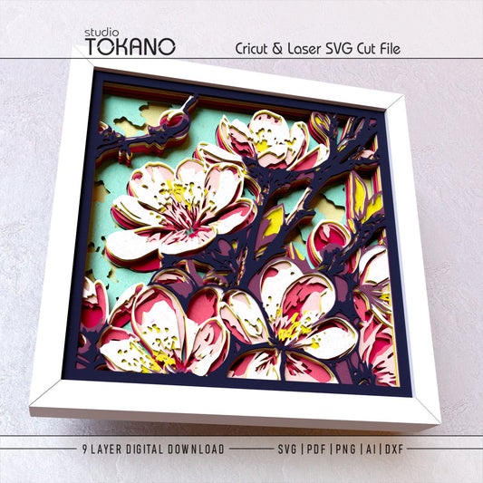 Side-angle view of the sakura shadow box SVG showing clean cut edges, dimensional cardstock layers, and delicate cherry blossom details.