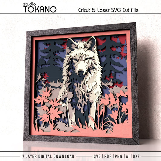 Framed wolf shadow box design shown from an angled view, highlighting the 3D depth, stacked cardstock layers, and clean wildlife artwork.