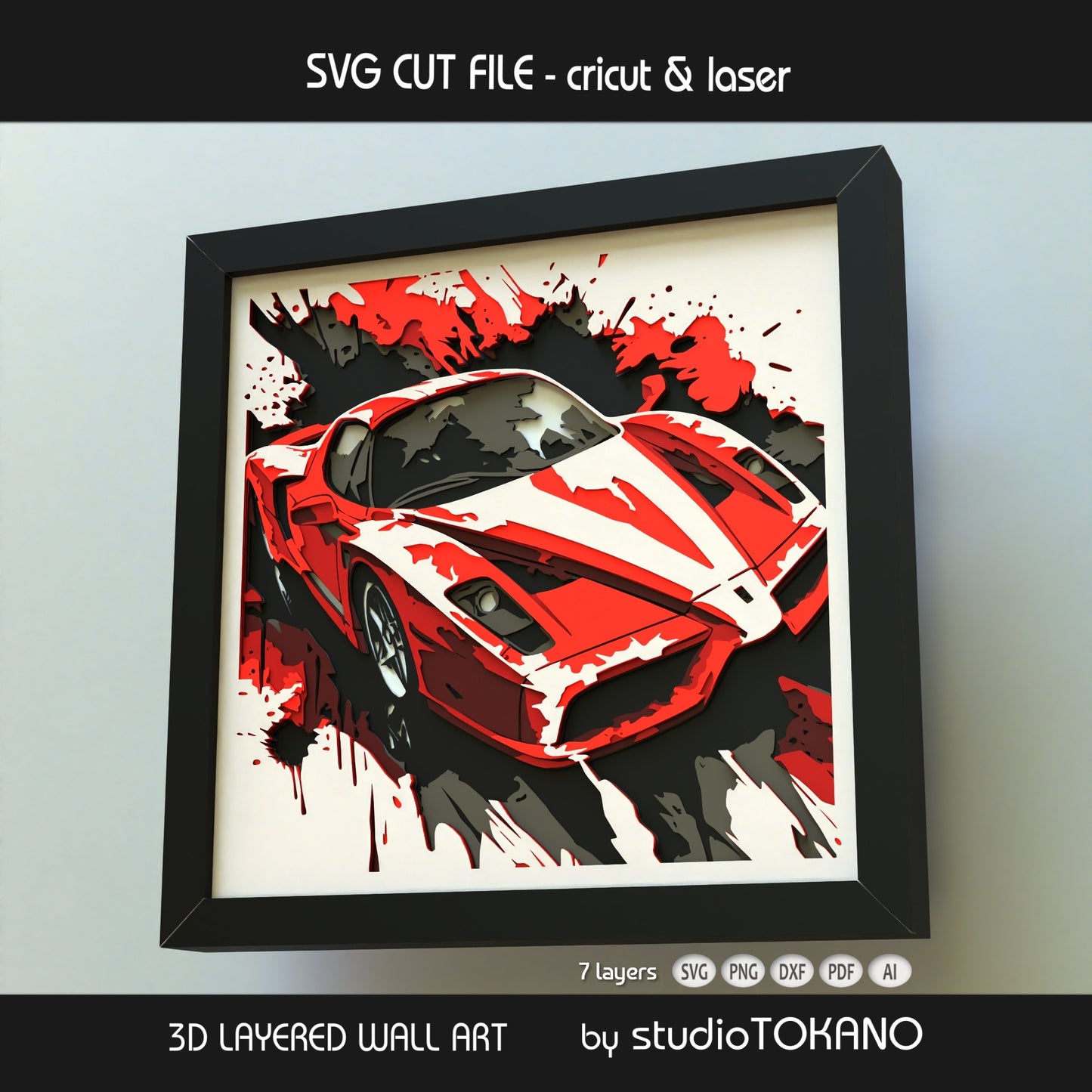 Close-up of the LaFerrari shadow box cut file showing clean layered cardstock detail, aerodynamic car shapes, and crisp papercut edges.