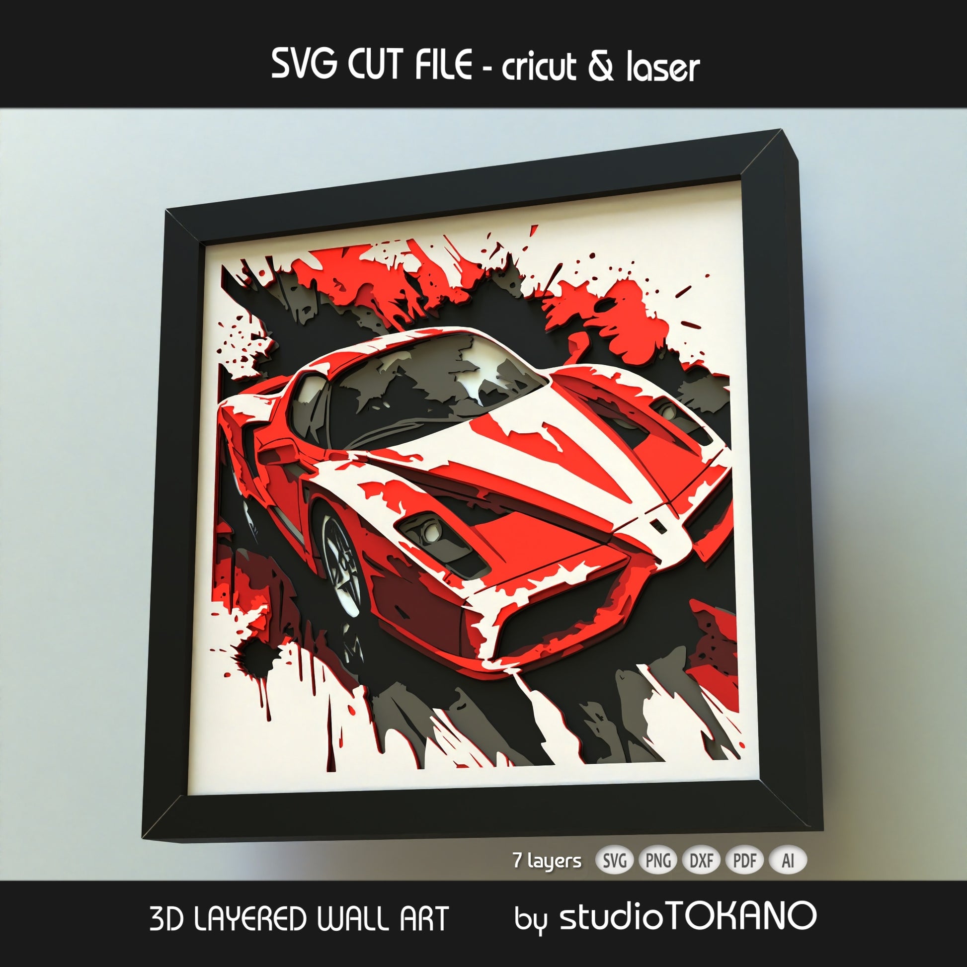 Close-up of the LaFerrari shadow box cut file showing clean layered cardstock detail, aerodynamic car shapes, and crisp papercut edges.