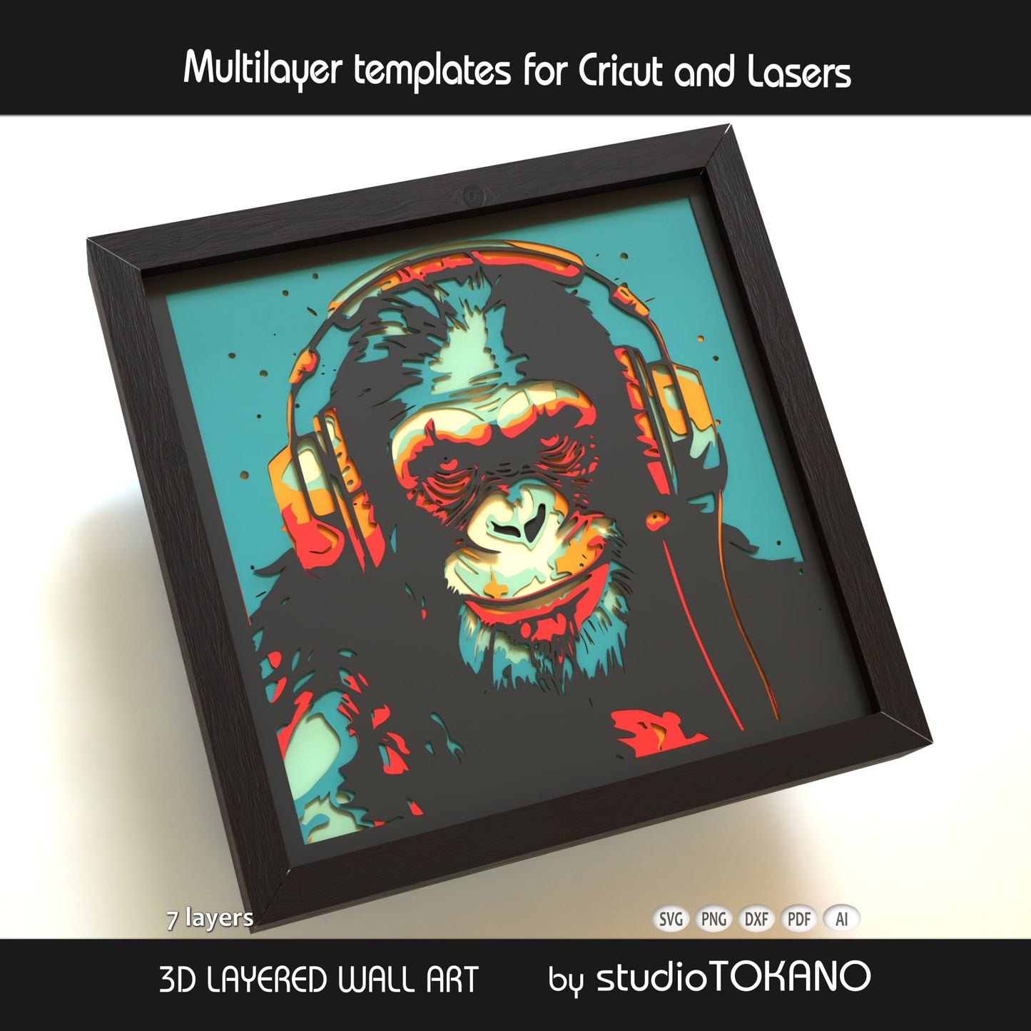 Close-up of the chimp shadow box cut file showing clean layered cardstock detail, headphone shapes, and crisp papercut lines.