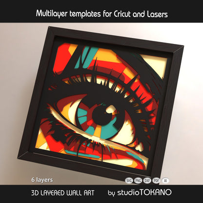 Eye papercut SVG design shown as framed multilayer wall art with colorful abstract layers for Cricut, Glowforge, xTool, and laser cutters.