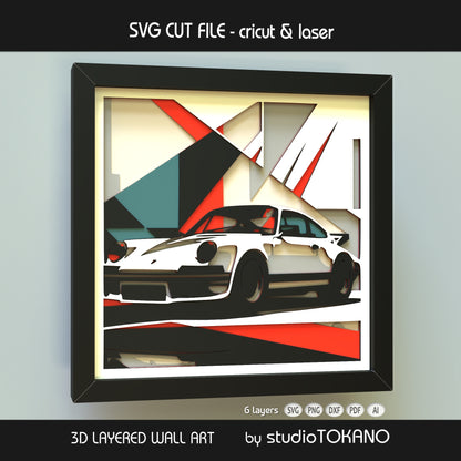 Close-up of the Porsche 911 shadow box cut file showing clean layered cardstock detail, sharp car lines, and crisp papercut edges.