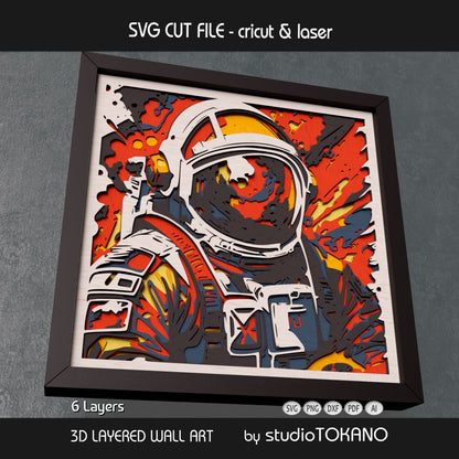 Astronaut 3D layered shadow box art designed as a Cricut and laser cut file for space decor and handmade gifts.