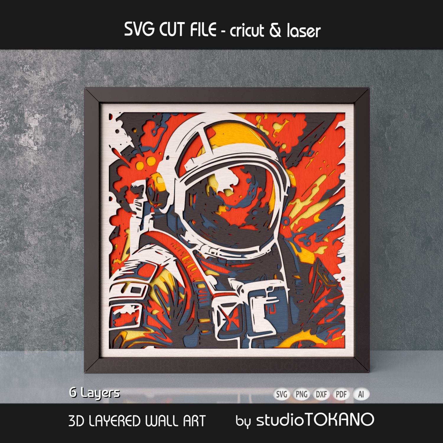 Framed astronaut layered wall art shown as a bold space papercut design with fiery colors and 3D depth.