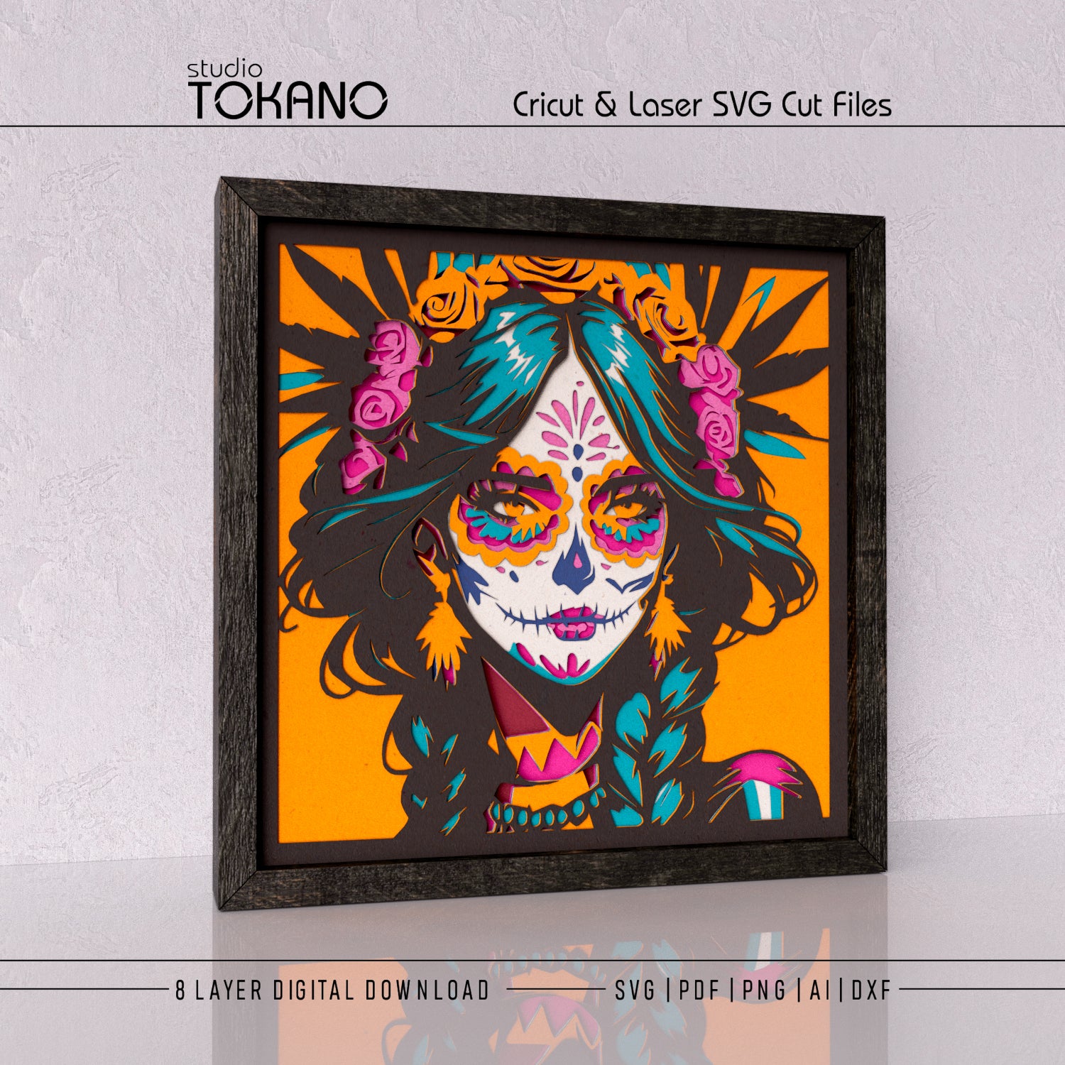 Colorful candy skull girl shadow box artwork with floral crown, bright cardstock accents, and a bold Día de los Muertos style.