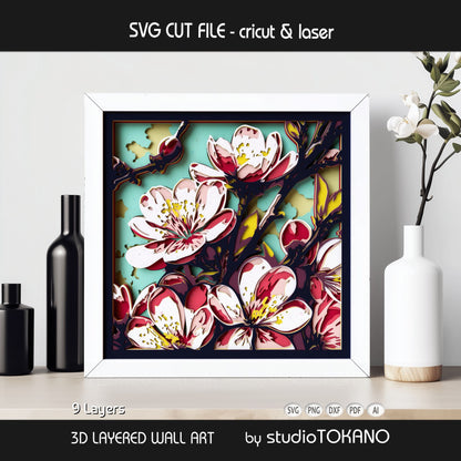 Framed cherry blossom layered wall art shown in an interior setting, highlighting the 3D depth, stacked cardstock layers, and elegant floral design.