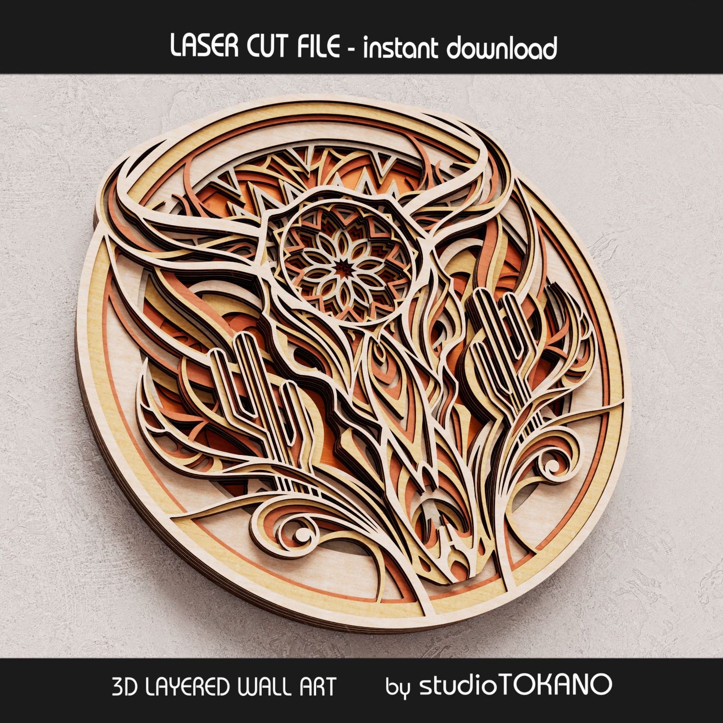 Close-up of the cow skull laser cut file showing stacked wood layers, cactus shapes, decorative cut details, and strong dimensional depth.