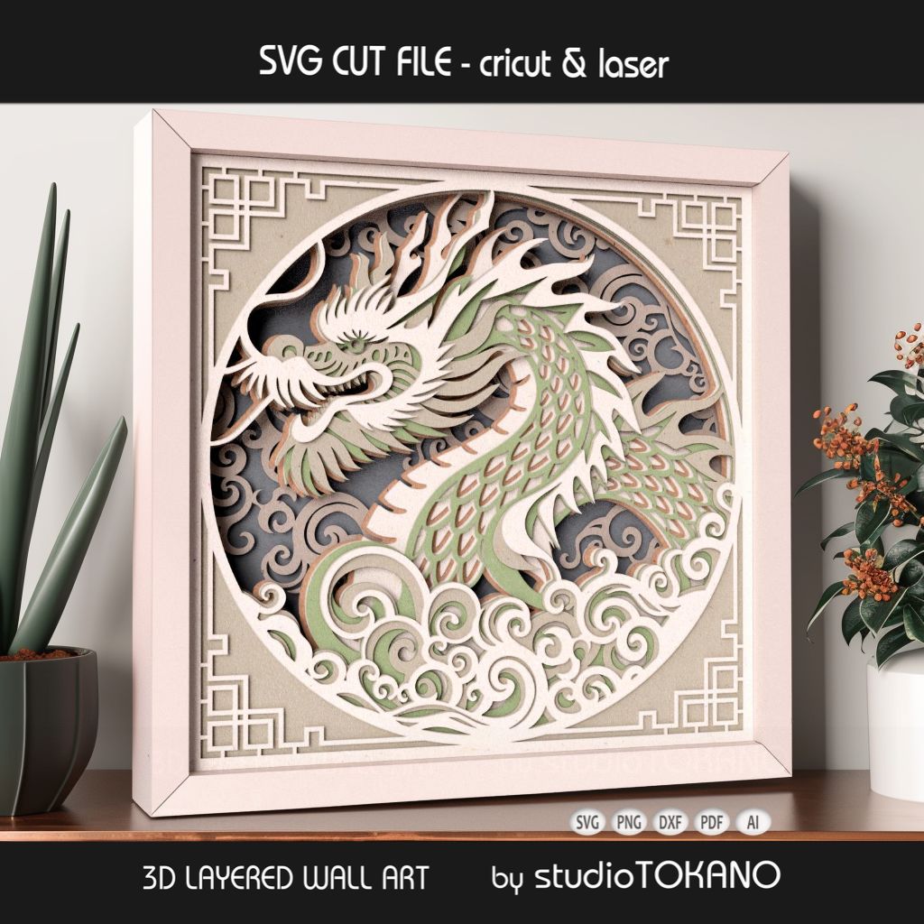 Decorative Asian dragon shadow box design shown in a white frame with clean cardstock layers and a polished finished look.