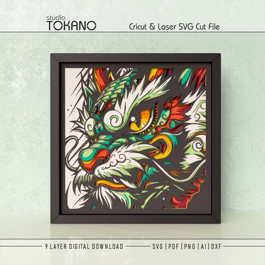 Dragon shadow box SVG displayed as framed 9-layer fantasy wall art for Cricut and laser cutting.