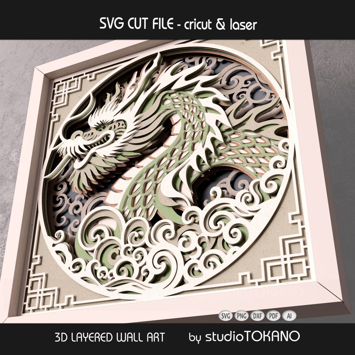 Dragon shadow box SVG displayed in extreme close up. Asian dragon wall art in green and neutral cardstock for Cricut and laser cutting.