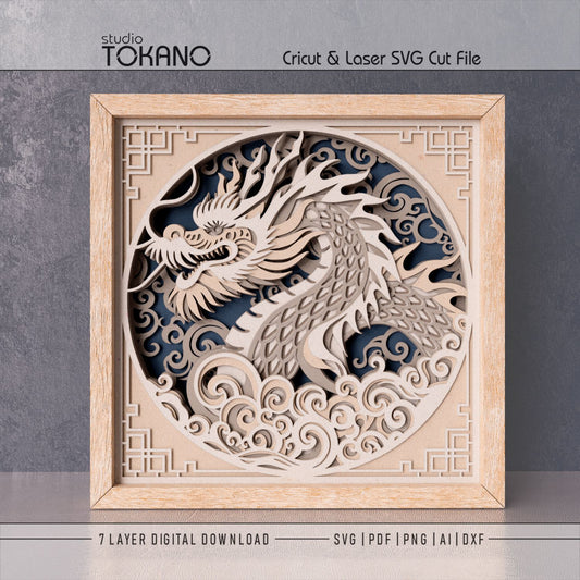 Dragon shadow box SVG displayed in extreme close up. Asian dragon wall art in green and neutral cardstock for Cricut and laser cutting.
