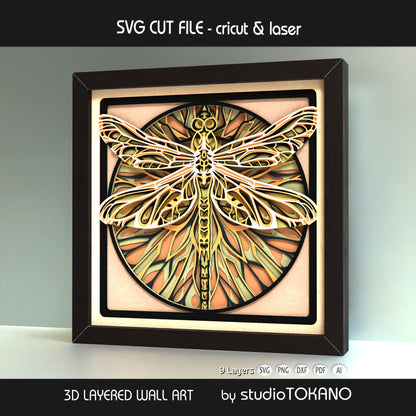 Framed dragonfly layered wall art shown as a decorative papercut design with mandala-inspired wings and 3D depth.
