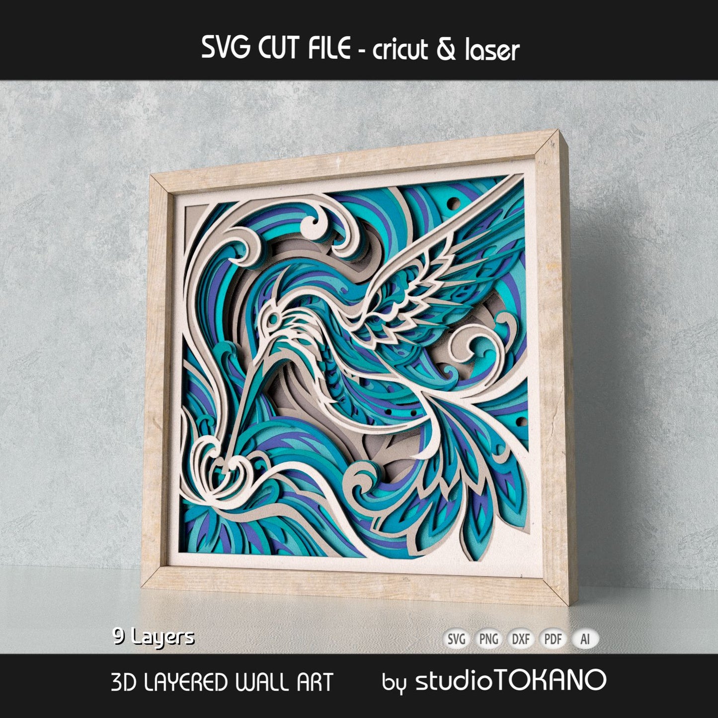 Framed hummingbird layered wall art shown as a flowing floral papercut design with soft botanical shapes and 3D depth.
