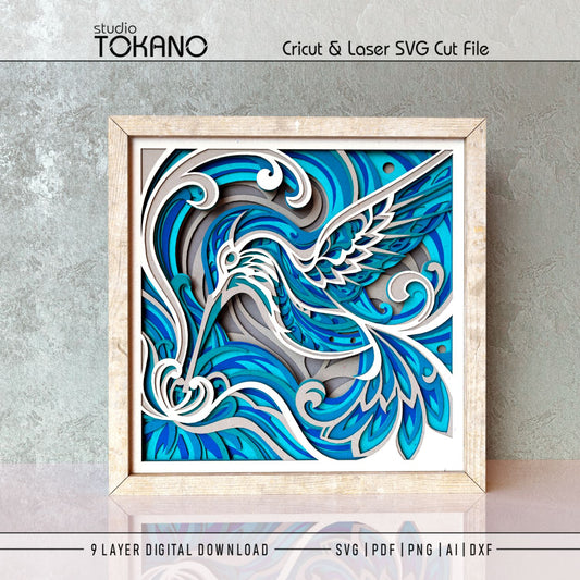 Hummingbird shadow box SVG displayed as framed 9-layer floral wall art for Cricut and laser cutting.