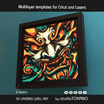 Japanese oni mask papercut wall art displayed in a shadow box frame as bold fantasy decor and statement craft art.