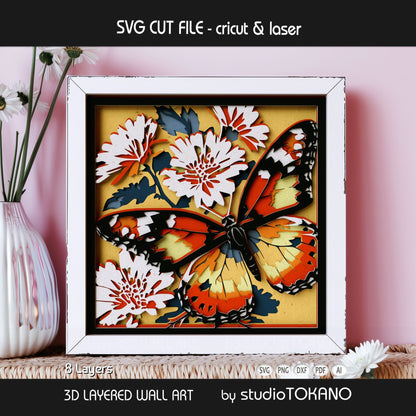 Monarch butterfly layered svg design showing the finished framed artwork and multilayer cut file structure for cardstock assembly.