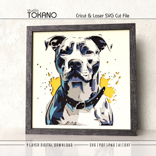 Side-angle view of the Pitbull shadow box SVG showing clean cut edges, dimensional cardstock layers, and bold dog portrait detail.