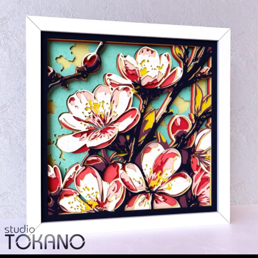 Sakura cherry blossom shadow box SVG shown as a 3D layered floral wall art video, highlighting cardstock depth, soft blossom details, and a finished Cricut and laser cut design.