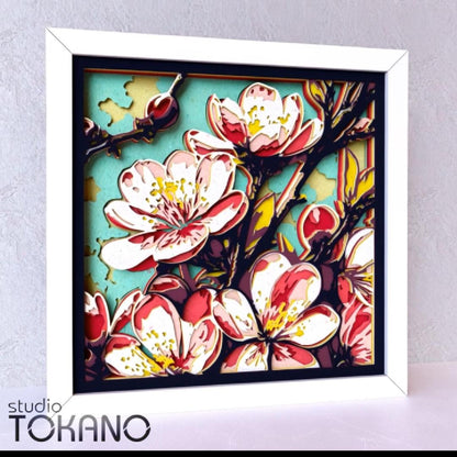Sakura cherry blossom shadow box SVG shown as a 3D layered floral wall art video, highlighting cardstock depth, soft blossom details, and a finished Cricut and laser cut design.