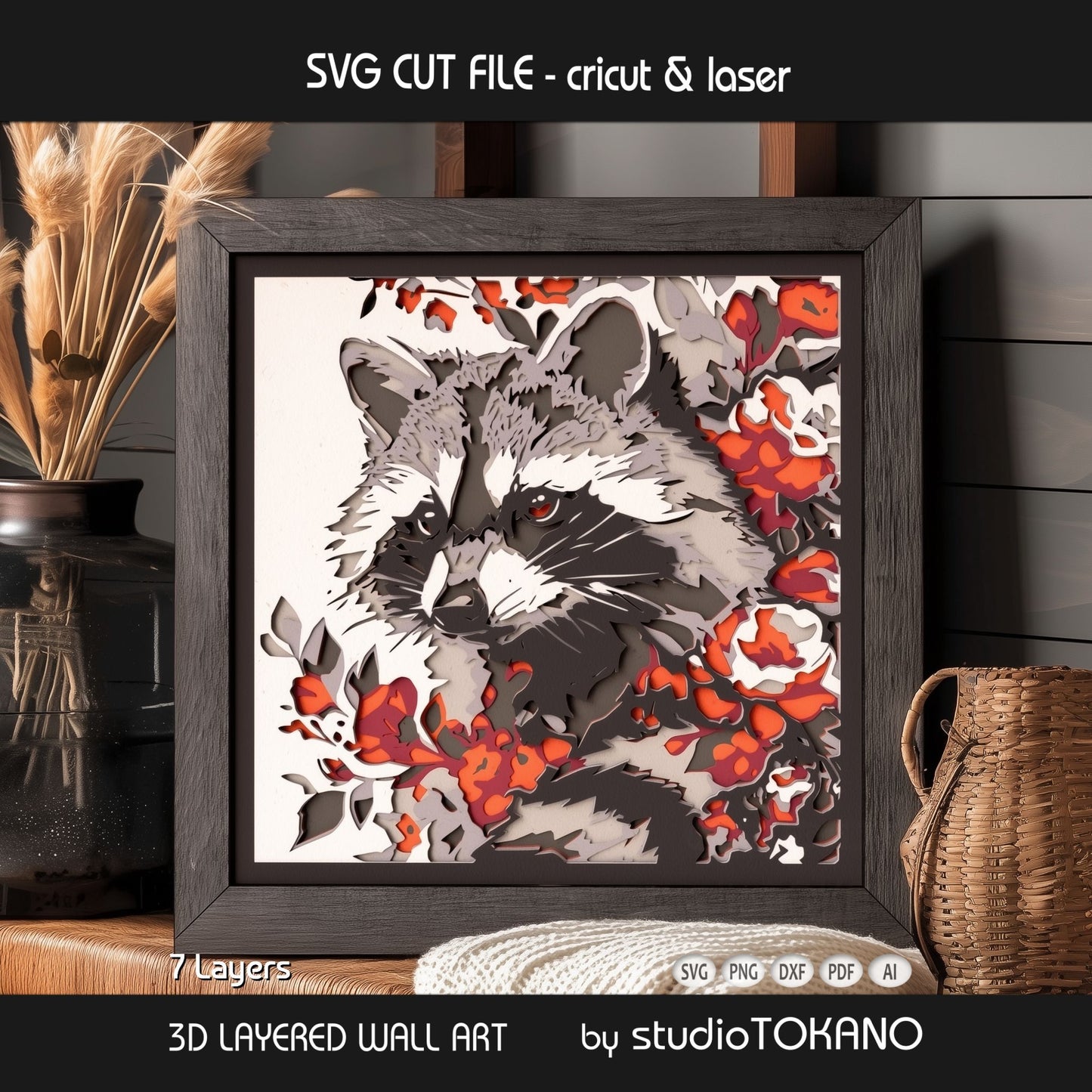 Raccoon shadow box SVG shown as a finished framed papercut design with woodland flowers and dimensional layered detail.