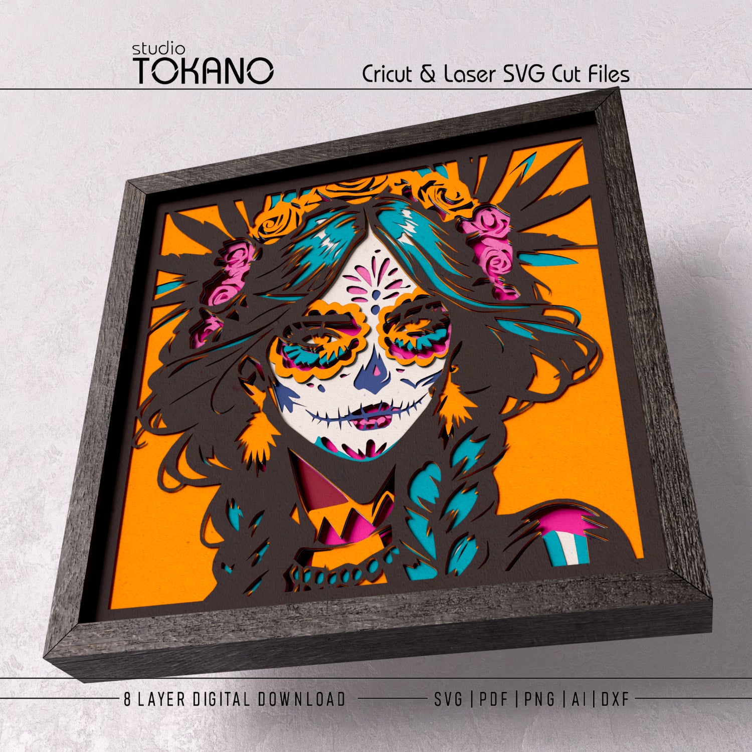 Sugar Skull Girl 3D layered SVG cut file shown as framed Day of the Dead wall decor for Cricut, Silhouette, and laser paper cutting.