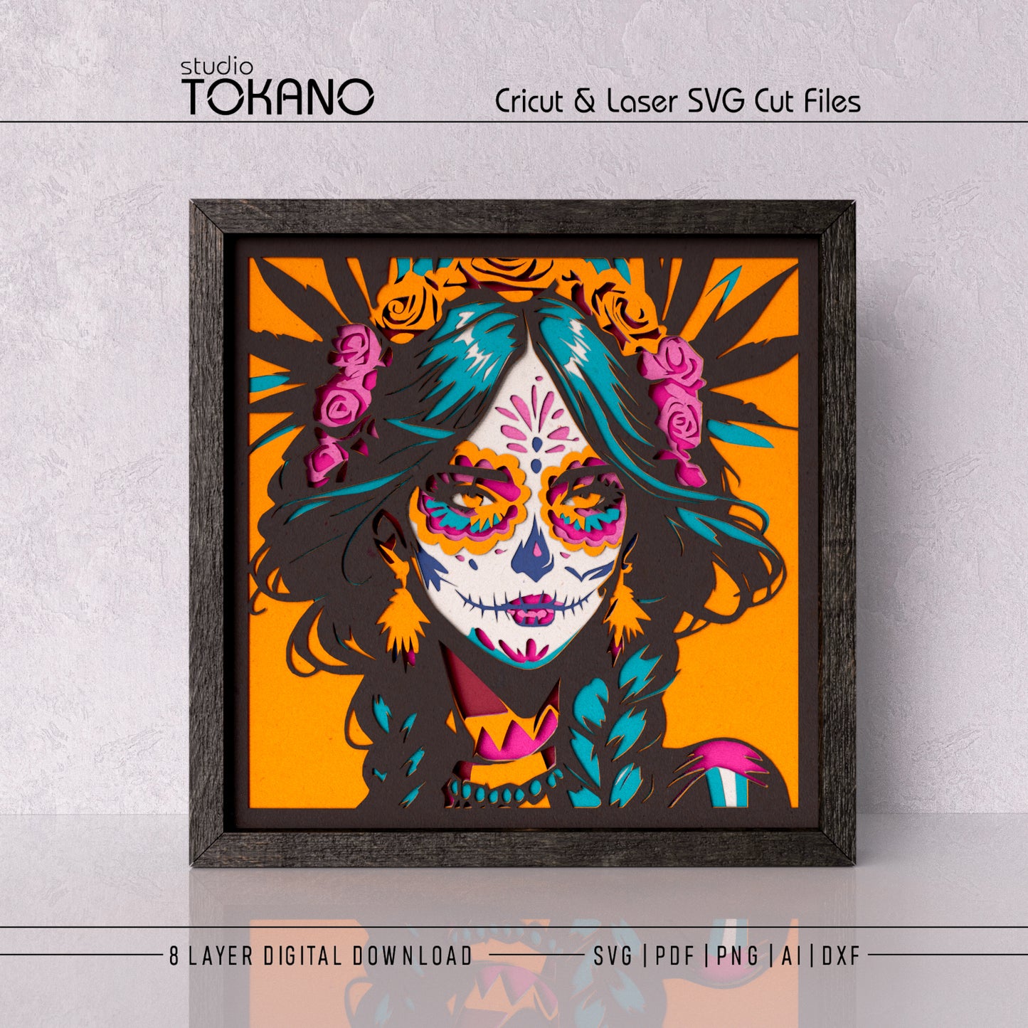 Sugar Skull Girl shadow box SVG displayed as framed 8-layer Día de los Muertos wall art in bright cardstock colors for Cricut and laser cutting.