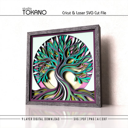 Colorful Tree of Life paper art created with turquoise, purple, pink, cream and green cardstock
