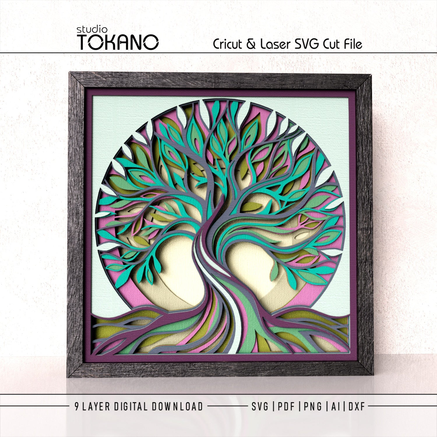 A framed layered tree-of-life wall art design shown on a light textured background, with text at the top reading 'studio TOKANO' and 'Cricut & Laser SVG Cut File,' plus '9 LAYER DIGITAL DOWNLOAD' and file formats at the bottom. The artwork features teal, pink, purple, olive green, cream, and gray layered branches and leaves inside a dark wood frame.