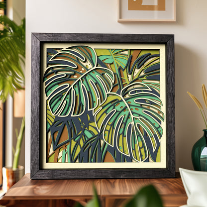 Tropical jungle shadow box with layered Monstera foliage for a colorful cardstock craft project
