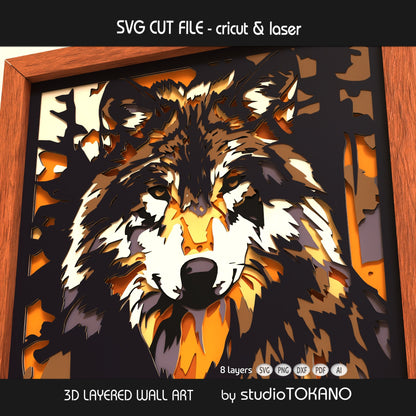 Wolf papercut wall art displayed in a shadow box frame, featuring warm woodland tones and dimensional 3D layered cardstock construction.