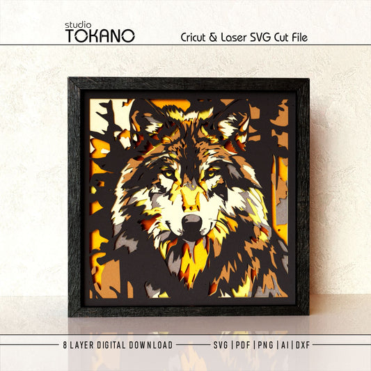 Wolf shadow box SVG shown as finished framed wall art, perfect for rustic cabin decor, wildlife wall art, and layered paper craft projects.